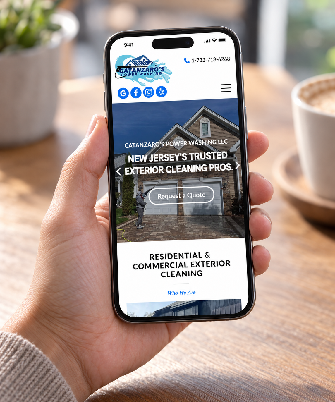 Catanzaro’s Power Washing website displayed on a handheld phone