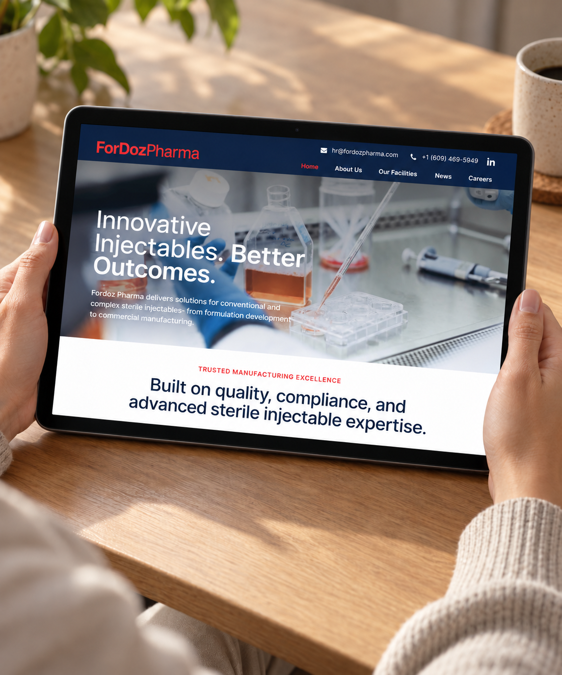 ForDoz Pharma website displayed on a handheld tablet