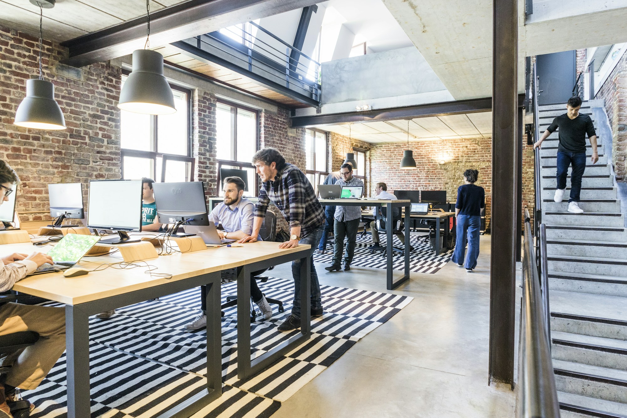 A collaborative office with people working at computers